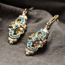 女人飾界 探索歐美時(shí)尚飾品的新浪潮——合金復(fù)古派對(duì)耳環(huán)與配飾的批發(fā)與直銷